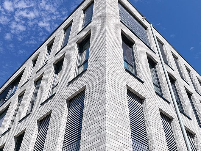 Жилое и коммерческое здание в Люнене фасад