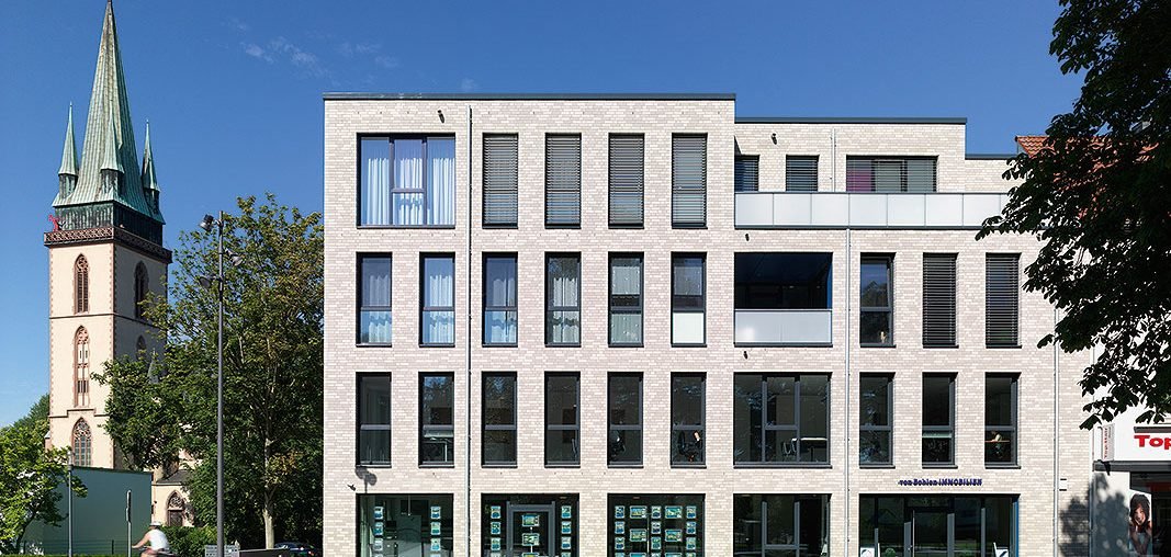 Жилое и коммерческое здание в Люнене